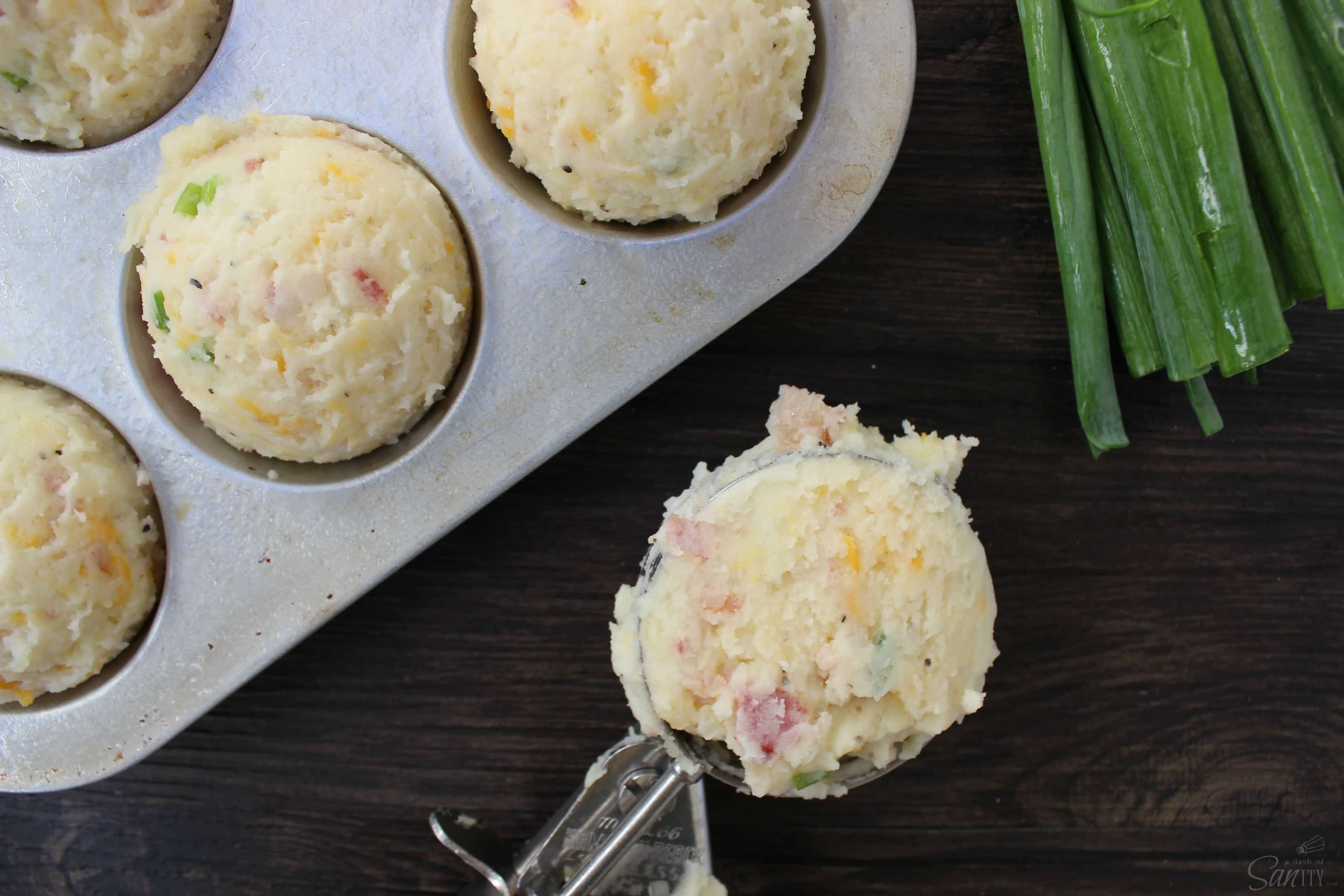 These Loaded Mashed Potato Cups are perfect for holiday gatherings. Easy to serve & prepare and are loaded with everything that is good - bacon and cheese.