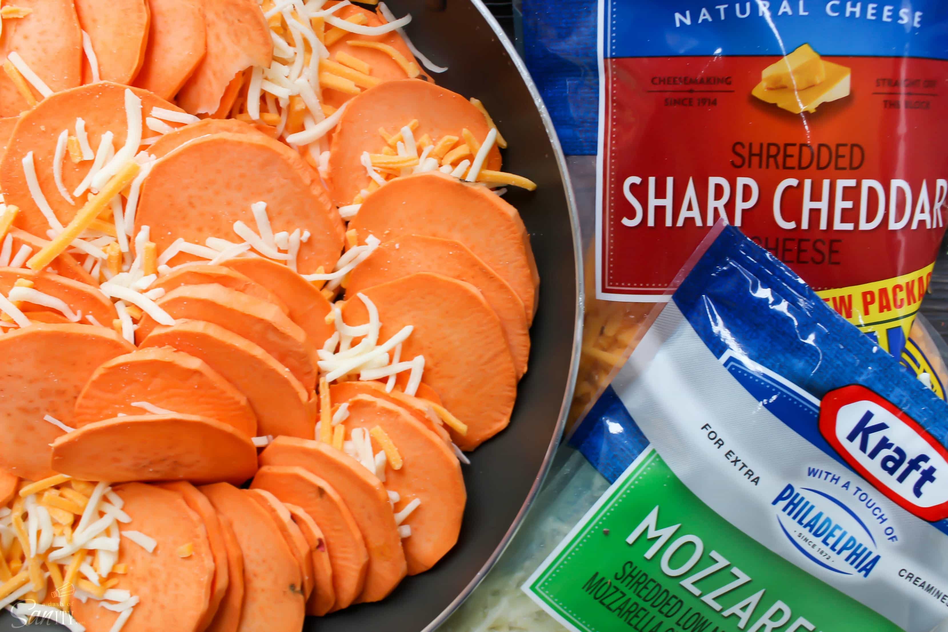 Skillet Scalloped Sweet Potatoes is an elegant twist on a holiday classic of Scalloped Potatoes. Layers of sweet potatoes, cheese, and a white cream sauce. Skillet Scalloped Sweet Potatoes is an elegant twist on a holiday classic of Scalloped Potatoes. Layers of sweet potatoes, cheese, and a white cream sauce.