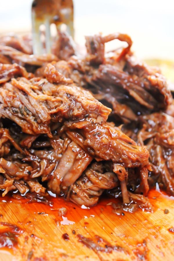 Easy Barbecue Beef Brisket on wood cutting board