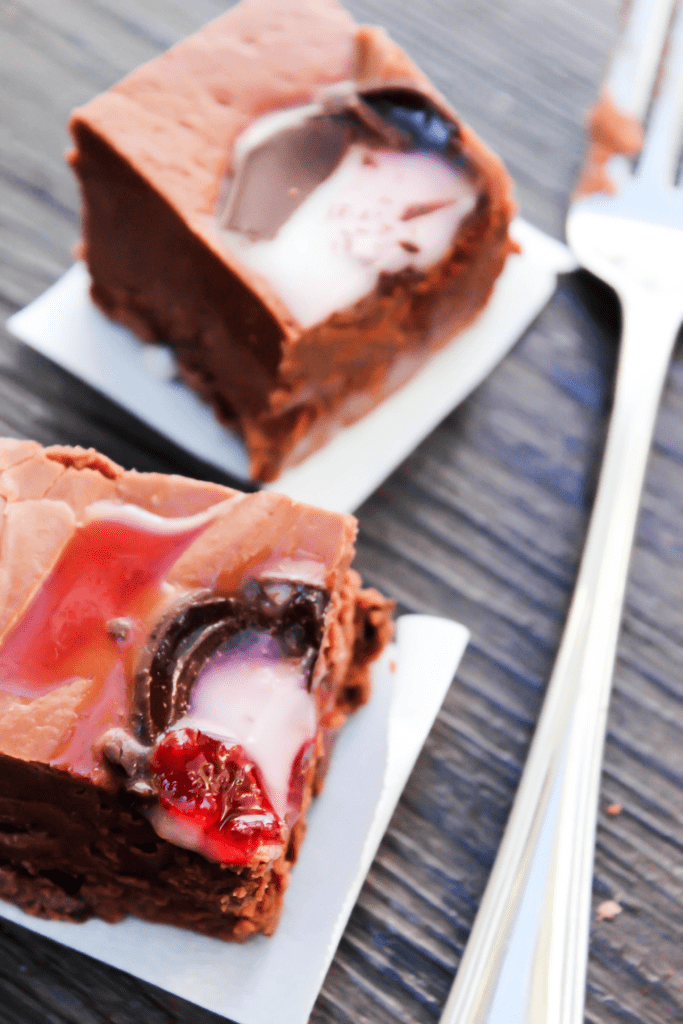 Chocolate Covered Cherries Fudge makes the perfect holiday treat. Taking chocolate covered cherries and placing them in the center of every fudgey bited