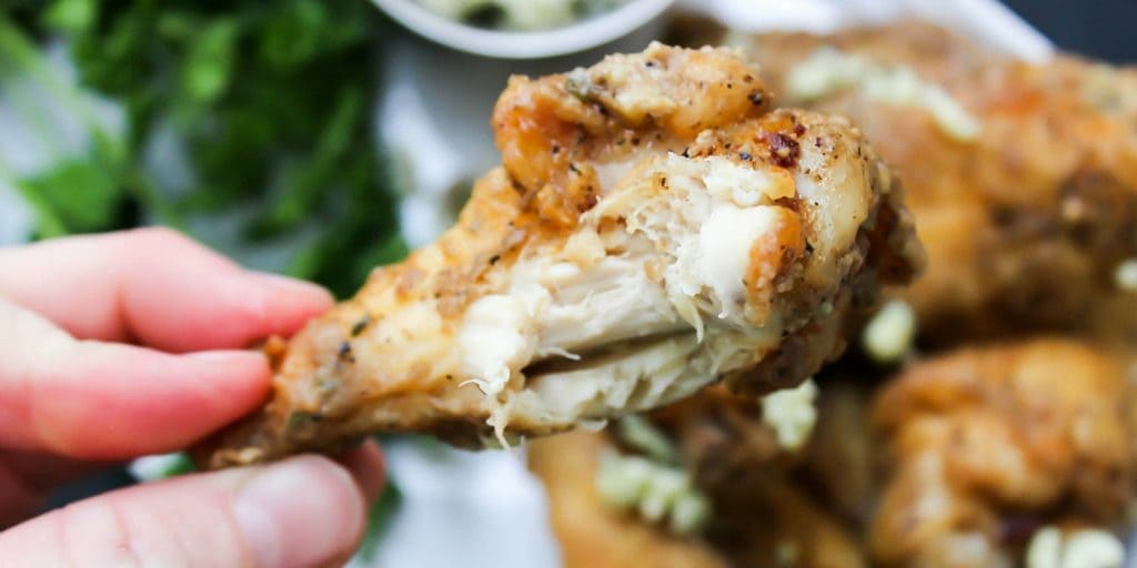 Black and Blue Chicken Wings are tossed in a blue cheese vinaigrette, pepper, three kinds of garlic, & crumbled blue cheese. This isn’t a wing for the weak.