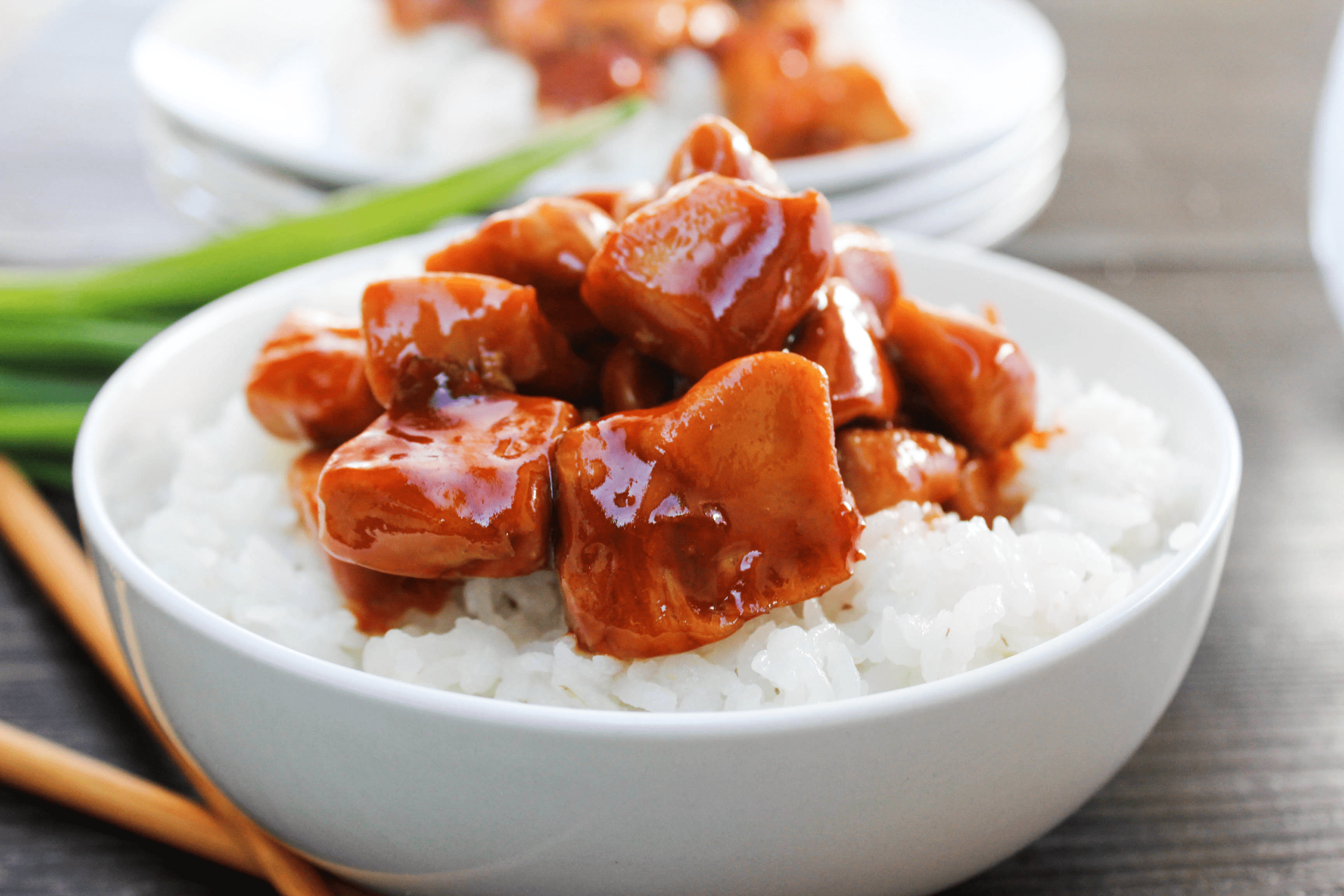 Bourbon Chicken is my favorite easy dinnertime meal. Served with rice, green onions, and lots of sauce, this meal is delicious and ready in just 30 minutes.