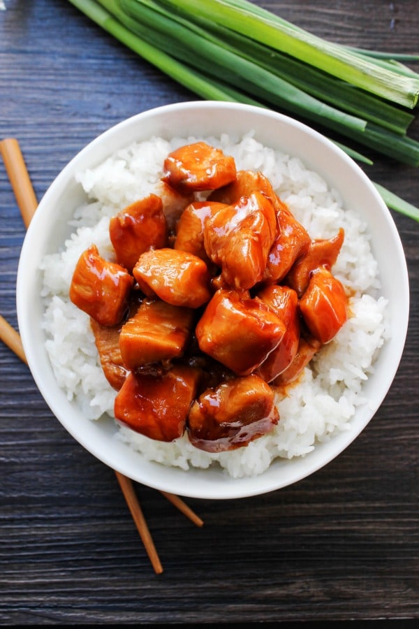 Bourbon Chicken is my favorite easy dinnertime meal. Served with rice, green onions, and lots of sauce, this meal is delicious and ready in just 30 minutes.