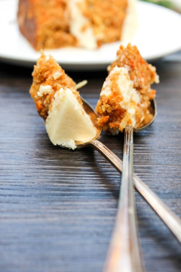 Carrot Cake with Maple Brown Sugar Buttercream & Candied Pecans with coconut, maple syrup, brown sugar, and pecans make a combo that will have you swooning. carrot cake on two forks