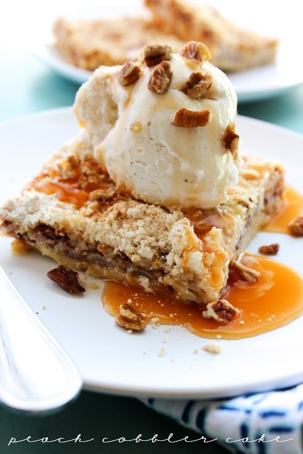Peach Cobbler Cake is where cake and cobbler collide into one pan. This is a deliciously easy to make dessert that will become an instant family favorite. Peach Cobbler Cake is where cake and cobbler collide into one pan. This is a deliciously easy to make dessert that will become an instant family favorite.