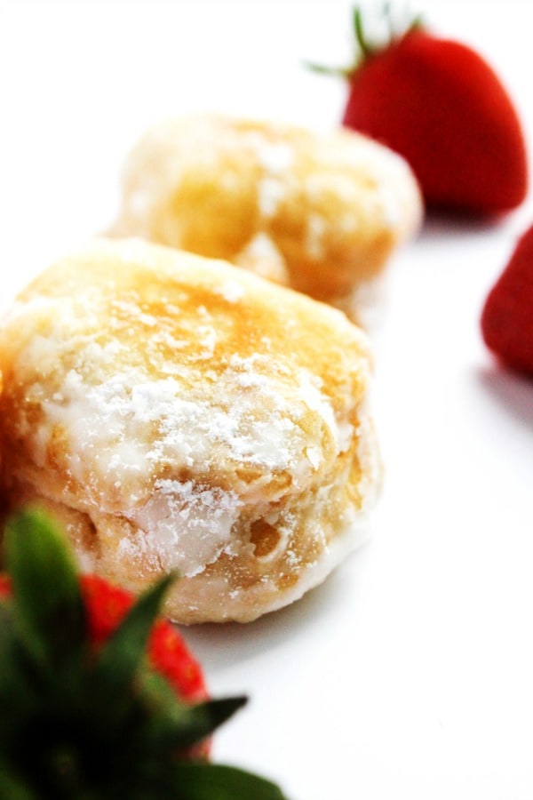 Strawberries & Cream Beignets is a classic dessert made with simple cream and beignets that are so easy to make. Strawberry season has never tasted so good.