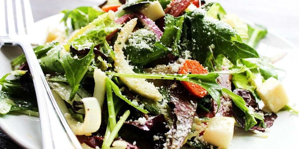 Copycat Carrabba's Chopped Salad is filled with flavors, textures, and a pop of color from the salami and kalamata olives. This salad is perfect for summer.