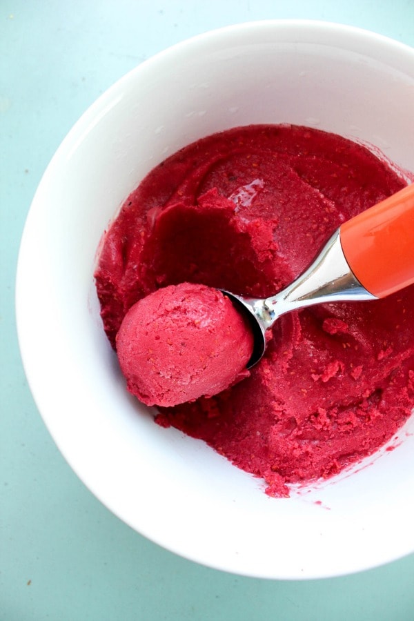 Raspberry Lime Frozen Yogurt is a tart "skinny" frozen yogurt that can be made in a matter of minutes. This will become a summer must have.
