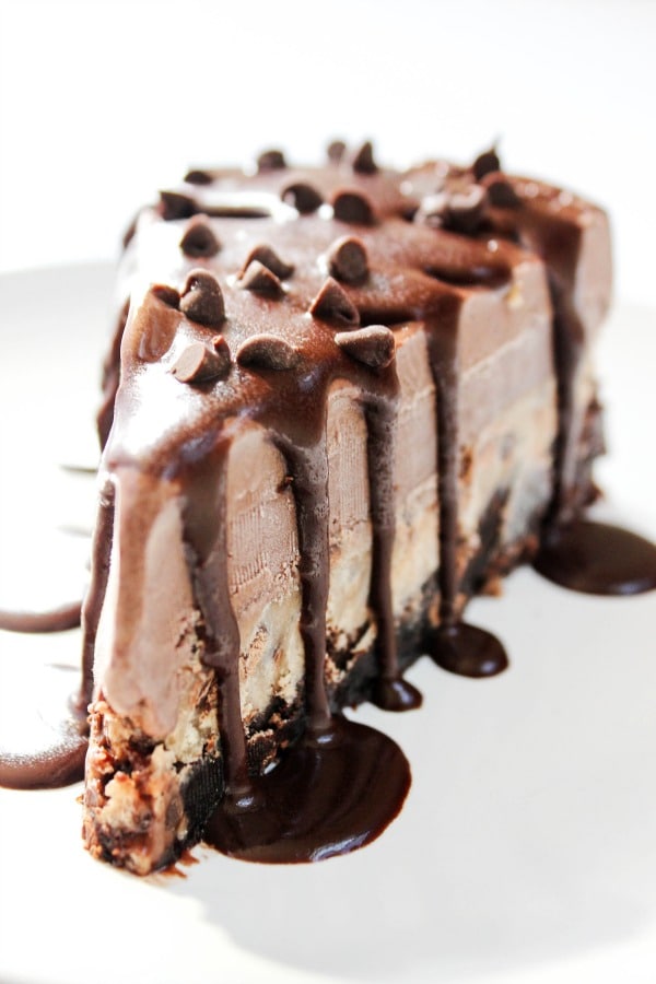 Brownie Chocolate Chip Cookie Dough Chocolate Ice Cream Cake is a layered cake of brownie, cookie dough, and chocolate ice cream, drizzled with hot fudge. Brownie Chocolate Chip Cookie Dough Chocolate Ice Cream Cake is a layered cake of brownie, cookie dough, and chocolate ice cream, drizzled with hot fudge.