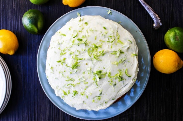 overhead shot of cake with a lemon and lime