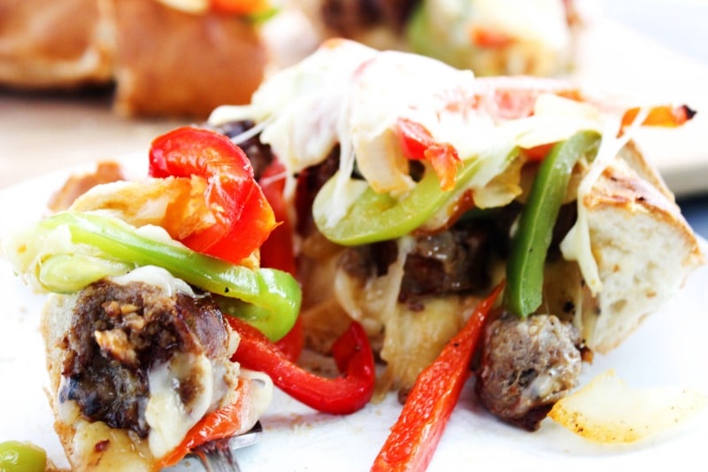 Cheesy Italian Sausage & Pepper Stuffed Bread is a twist the classic ball park sandwich, made into a fantastically easy meal. Cheesy Italian Sausage & Pepper Stuffed Bread is a twist the classic ball park sandwich, made into a fantastically easy meal. sausage-pepper-stuffed-bread-fork