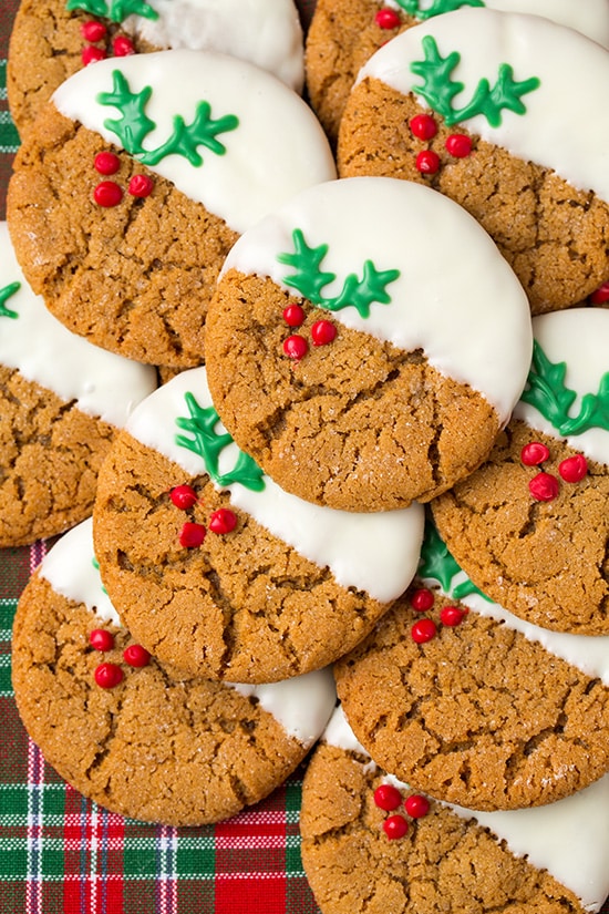 White Chocolate Dipped Ginger Cookies with red and green holly icing decoration