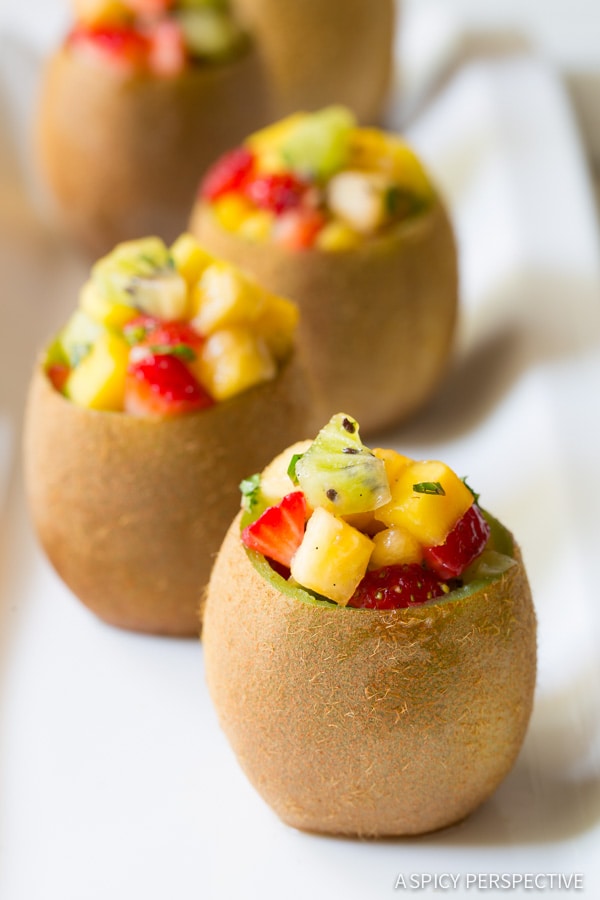 Tropical fruit salad served in hollowed out pears