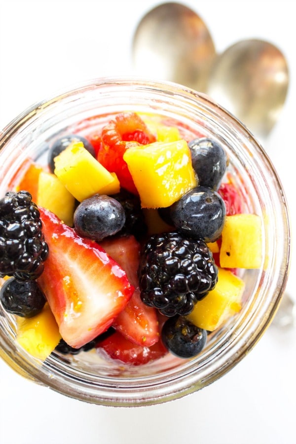 overhead shot of mason jar full of fruit salad