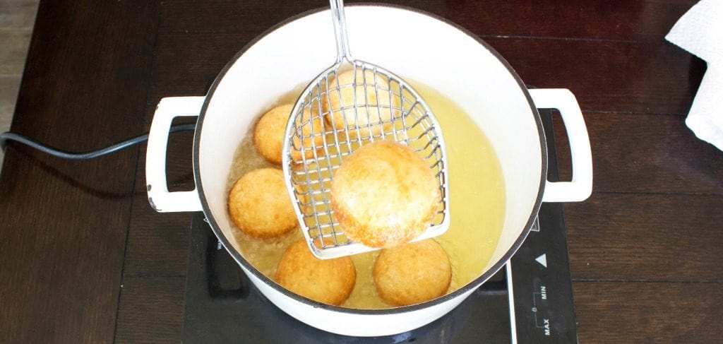 frying pan with donuts in it
