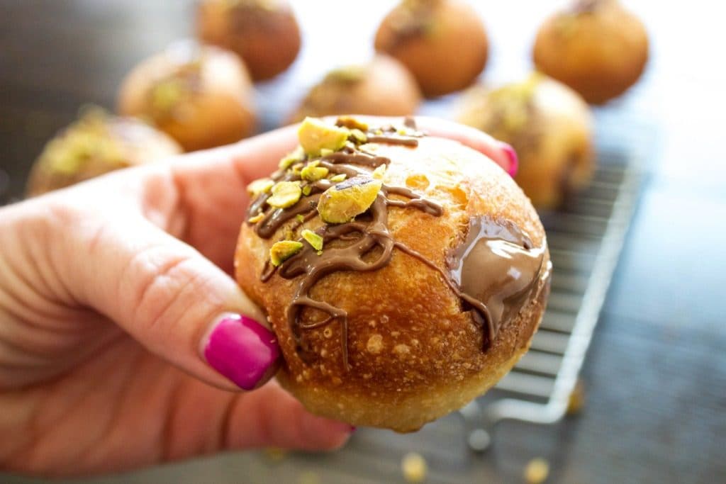 hand holding a Nutella donuts