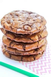 chewy flourless chocolate cookies, starbucks, green straw, stack of chocolate cookies
