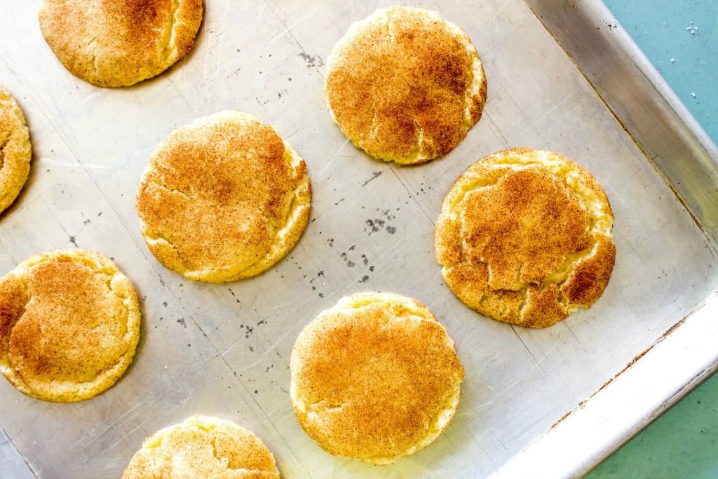 Finished cookies on metal cookie sheet.
