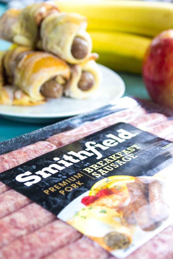 BREAKFAST PIGS IN A BLANKET - a cinnamon roll wrapped around a breakfast sausage link. There isn't a more delicious way to eat "pigs in a blanket".