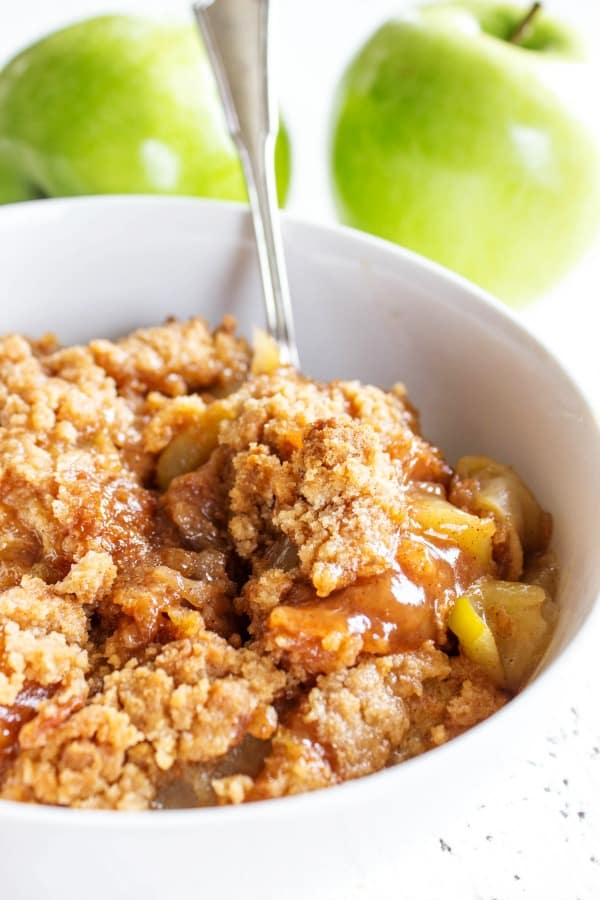 BEST EVER APPLE CRISP is one of our family favorites desserts. Maple caramelized apples and a crisp sweet topping, nothing beats this fall treat.