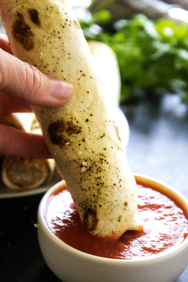 Chicken Parmesan Taquitos - Filled with chicken, cheeses & Italian seasoning, dunk in a marinara sauce & you have a simpler twist on an Italian classic.