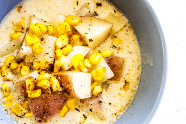 Easy & delicious, this SLOW COOKER POTATO & CORN CHOWDER is the ultimate comfort food. The secret to this chowder recipe is cheese, lots of cheese.