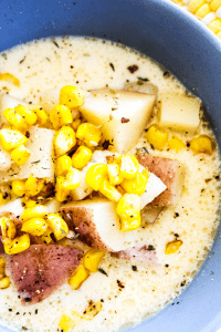 Easy & delicious, this SLOW COOKER POTATO & CORN CHOWDER is the ultimate comfort food. The secret to this chowder recipe is cheese, lots of cheese.