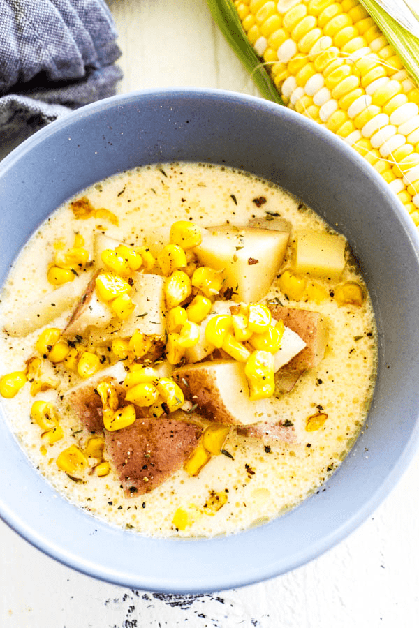 Easy & delicious, this SLOW COOKER POTATO & CORN CHOWDER is the ultimate comfort food. The secret to this chowder recipe is cheese, lots of cheese.