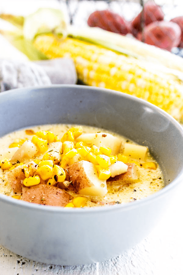 Easy & delicious, this SLOW COOKER POTATO & CORN CHOWDER is the ultimate comfort food. The secret to this chowder recipe is cheese, lots of cheese.