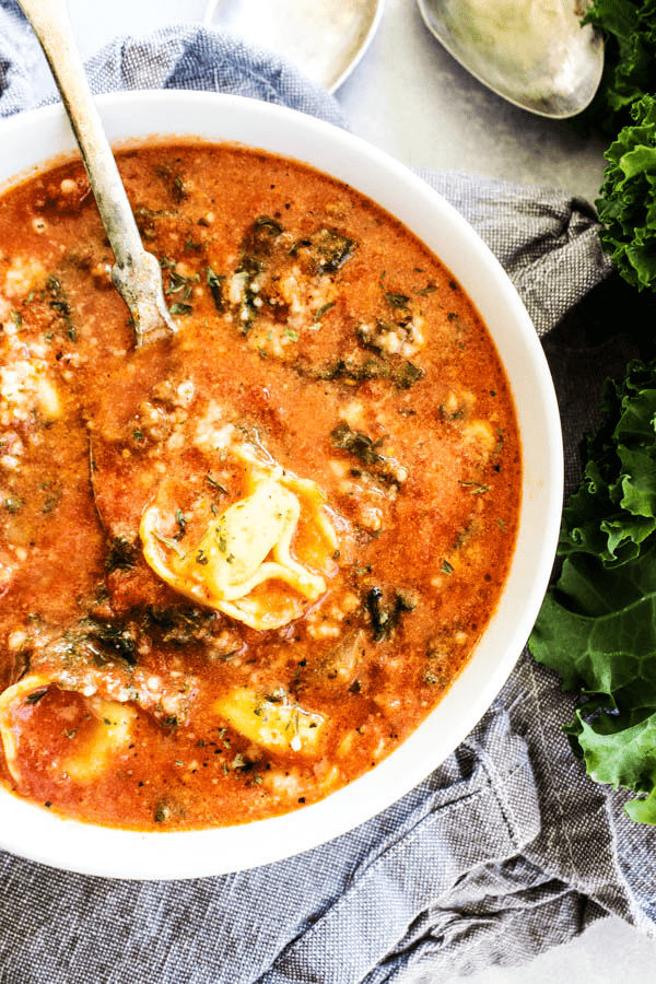 This hearty SLOW COOKER TUSCAN TORTELLINI SOUP will be a family favorite. Delicious & easy to make, you're simply going to love how easy it comes together. SLOW COOKER TUSCAN TORTELLINI SOUP