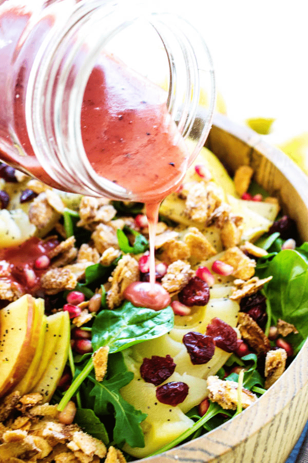 The perfect holiday salad this SPINACH SALAD WITH APPLES, PEARS, CRANBERRIES & CANDIED ALMONDS is easy to prepare and gorgeous to the eye.