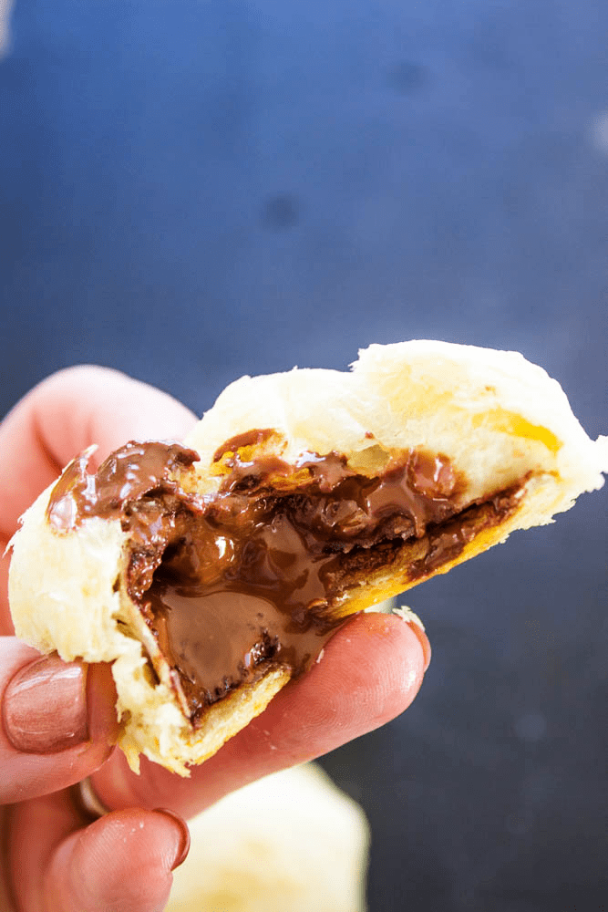 hand holding Pain Au Chocolat 