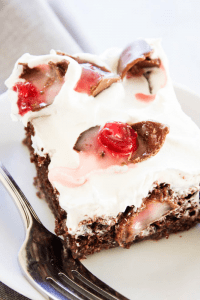 CHOCOLATE COVERED CHERRY POKE CAKE - A rich & gooey chocolate cake with chocolate covered cherries; spread some holiday cheer with this simple dessert.