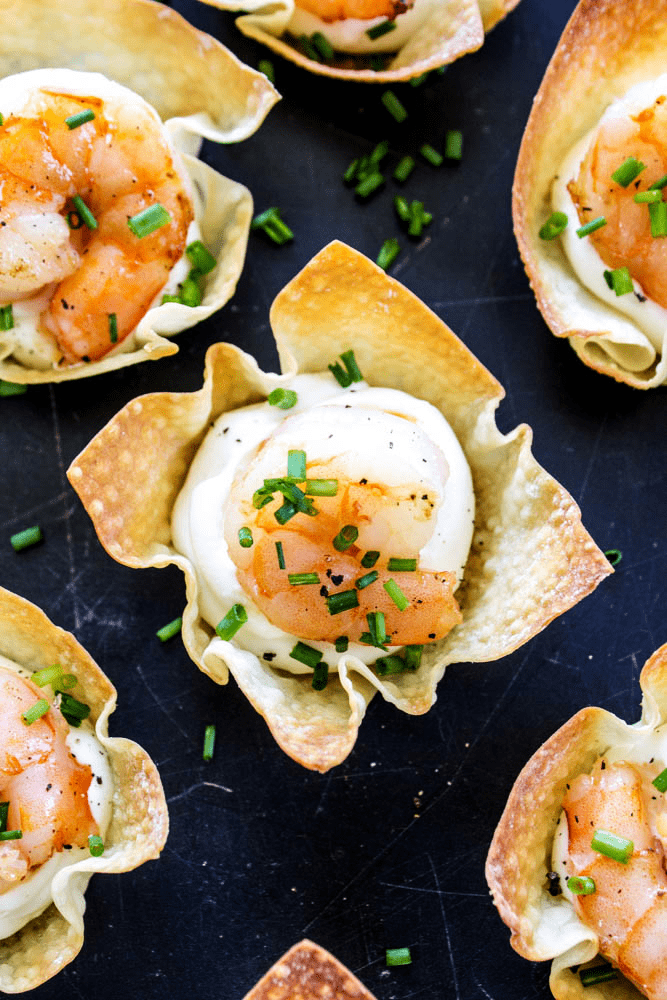 baked shrimp wontons with cream cheese, shrimp and green onions overhead shot