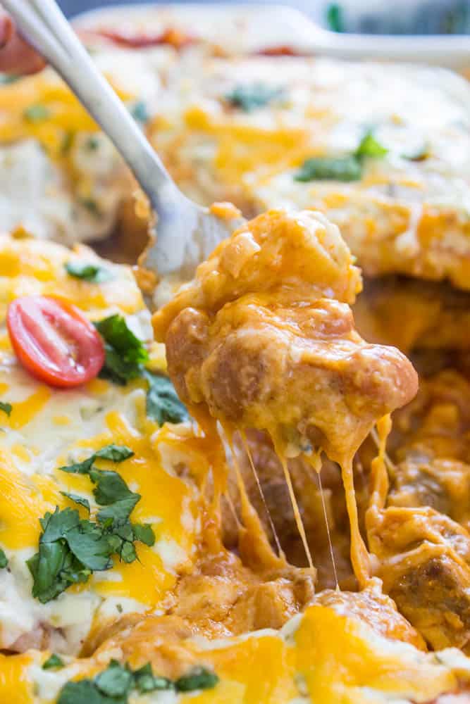 bite of Steak and Queso Enchilada Casserole on a fork