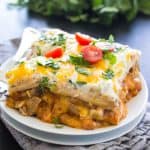 STEAK AND QUESO ENCHILADA CASSEROLE – an easy dinner for the holidays and great for gatherings. This cheesy casserole is baked to perfection.