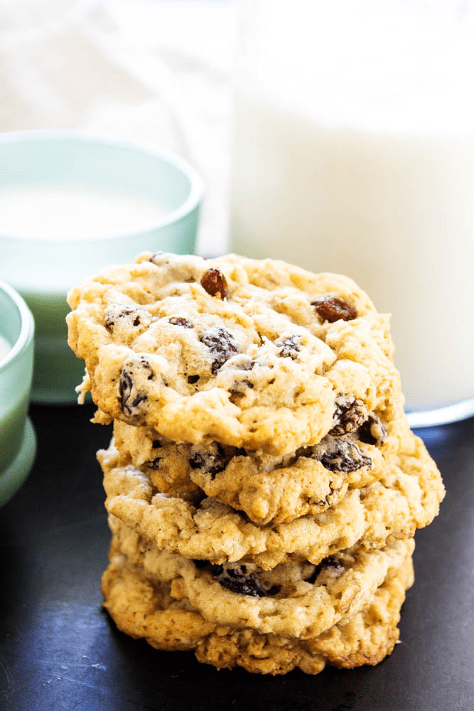 stack of 5 Oatmeal Raisin Cookies with a glass of milk