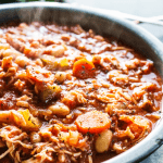 Deliciously simple slow cooker ITALIAN CHICKEN STEW is comforting and full of flavor. Loaded with veggies and chicken it's hearty making a perfect dinner.