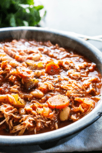 Deliciously simple slow cooker ITALIAN CHICKEN STEW is comforting and full of flavor. Loaded with veggies and chicken it's hearty making a perfect dinner.