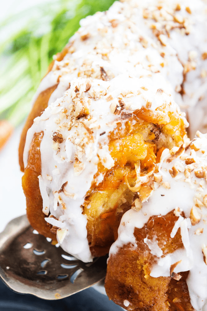 Close up photo of carrot cake monkey bread being sliced