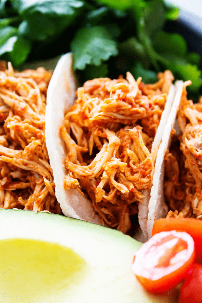 Chile Colorado Slow Cooker Chicken in tortillas up close