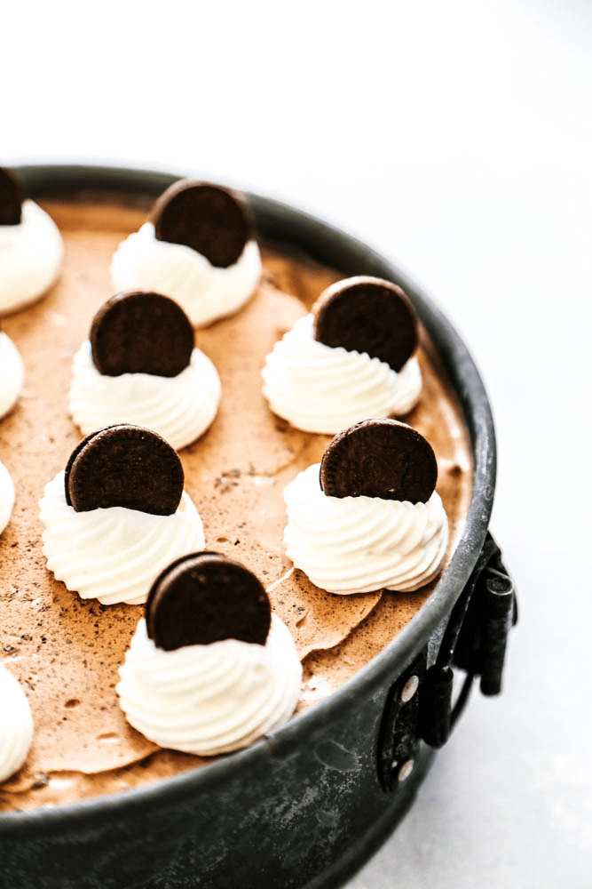 chocolate oreo ice cream cake in a spring form pan