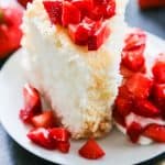 Angel Food Cake is a summer must have in our home. Light and fluffy, with the perfect amount of sweetness, this recipe for homemade angel food cake is so easy to make from scratch.