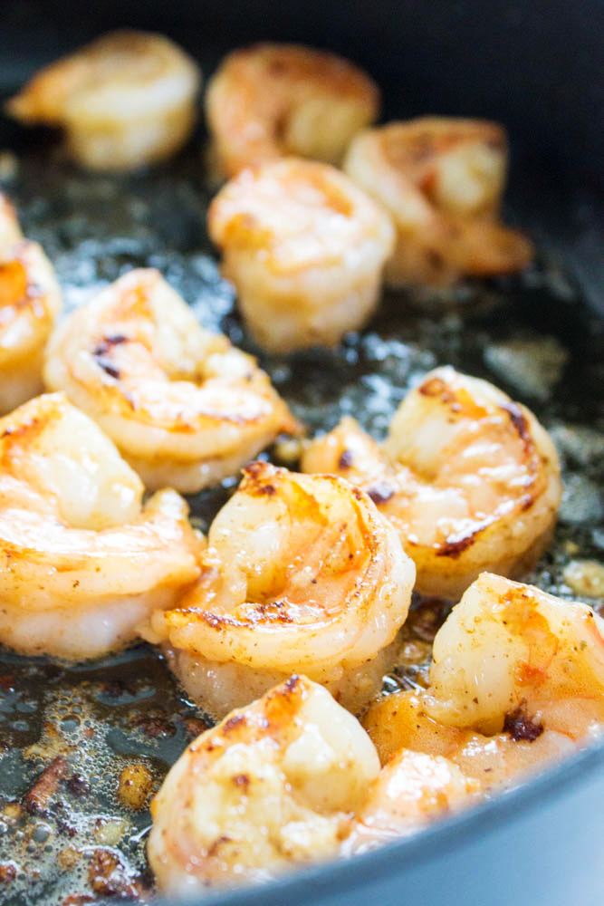 garlic shrimp cooking in skillet