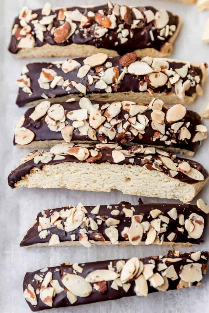 biscotti on bakig sheet with chocolate and almonds
