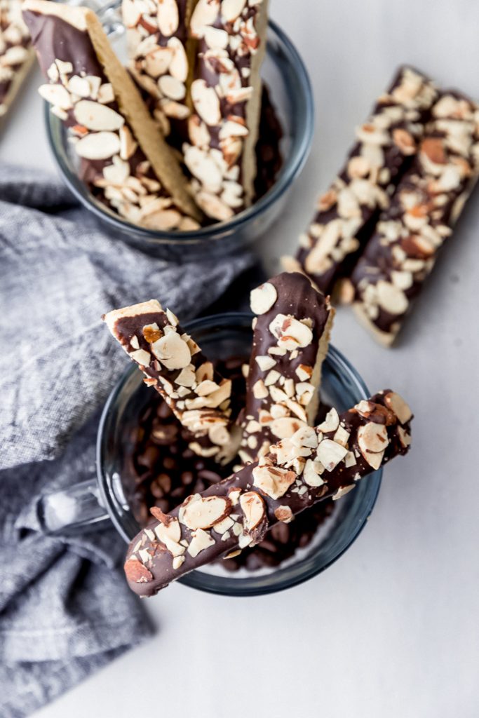 chocolate almond biscotti pieces in glass cups
