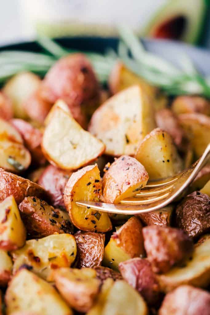 roasted potatoes on a fork