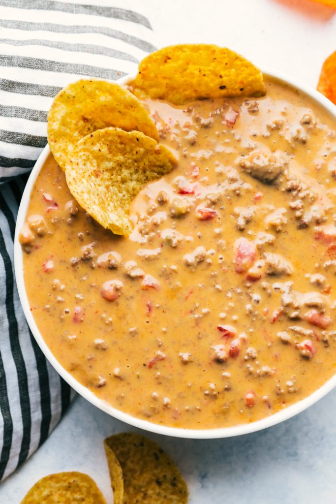 photo of bowl of beef queso with tortilla chips