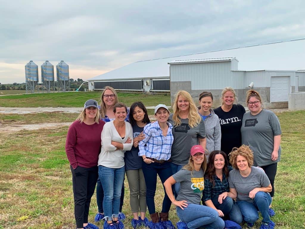 photo of sandra and her friends at Iowa Corn farm