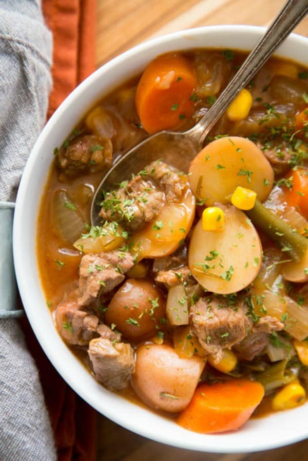 bowl of beef stew with spoon